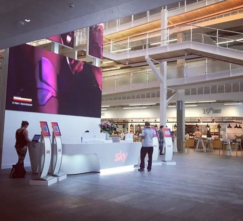The foyer at Sky HQ in Isleworth, with its giant screen and Sky reception desk